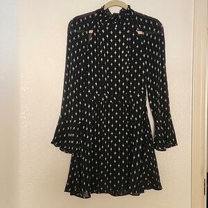 H&M Black/White Short Dress with mockneck, flared sleeves, and open back.